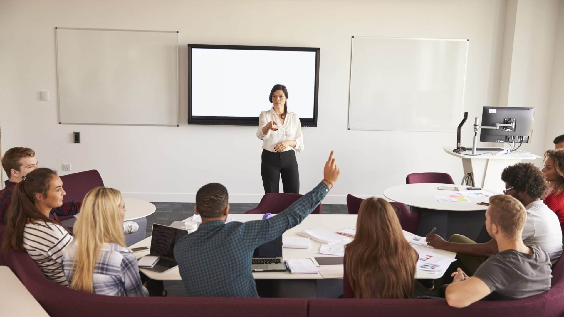 University Students Attending Lecture On Campus